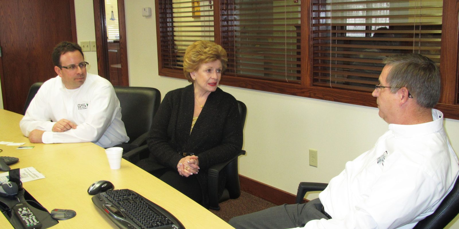 People meeting around a table in an office